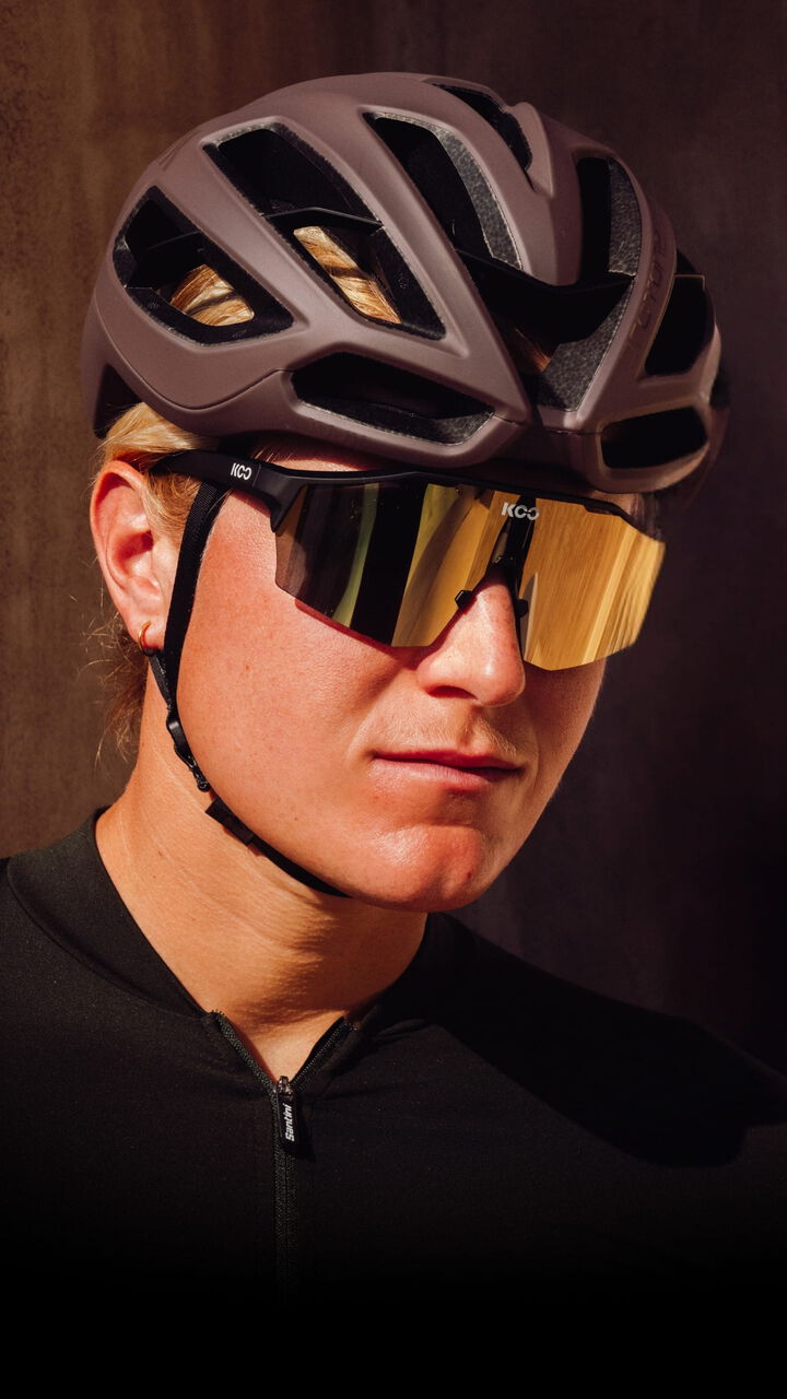 Cyclist wearing KOO Alibi sunglasses and KASK Protone Icon helmet.